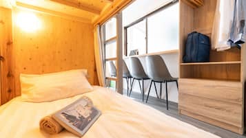 Signature Quadruple Room, Multiple Beds, Balcony, City View | Laptop workspace, soundproofing, free WiFi, bed sheets