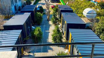 Standard Triple Room, Garden View | Terrace/patio