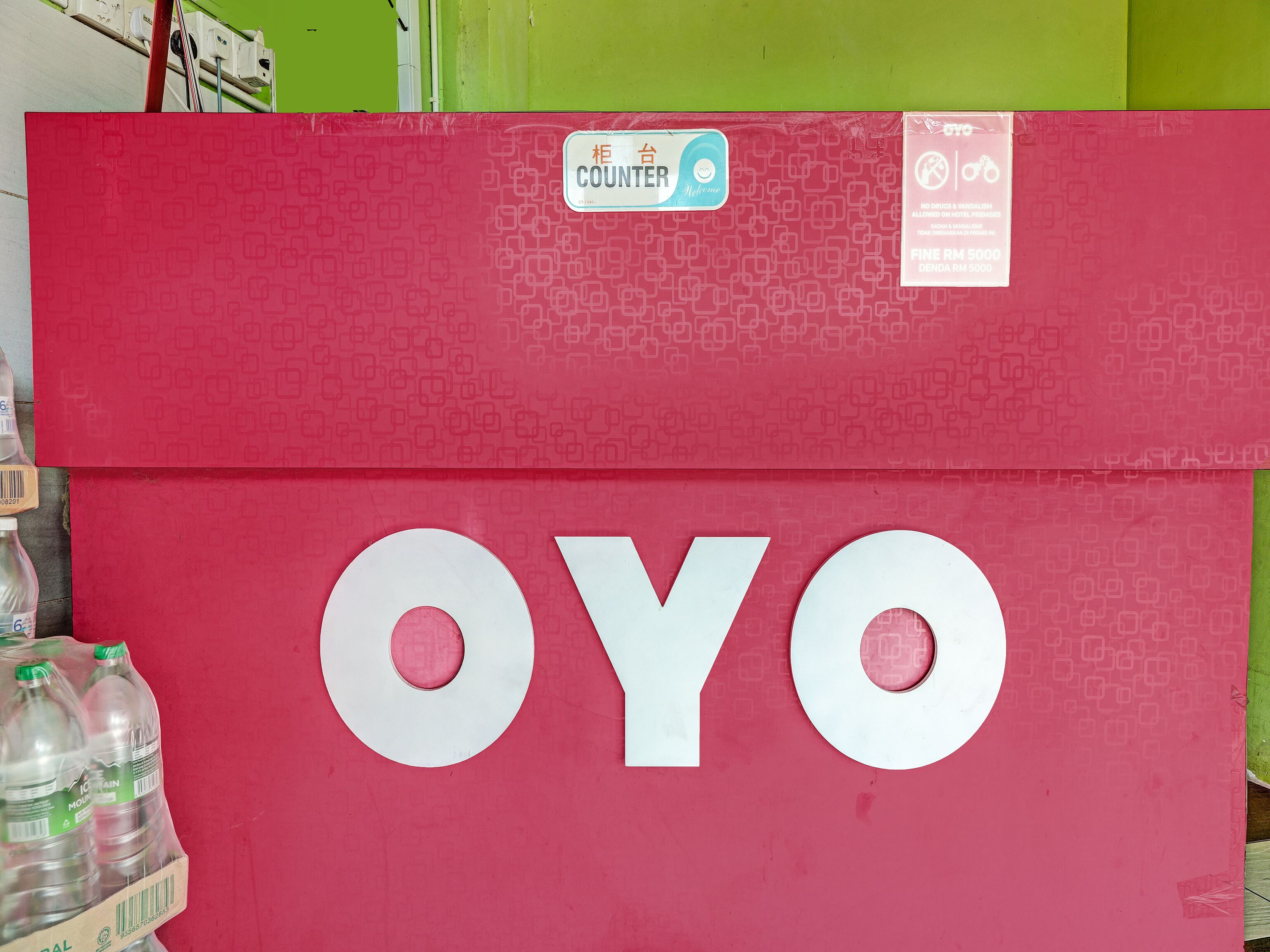 A red counter with the word "OYO" prominently displayed.