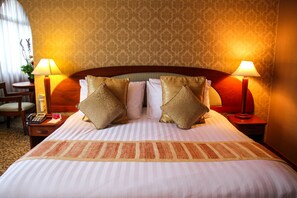 Suíte executiva | Roupas de cama premium, cofres nos quartos, cortinas blackout