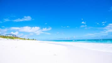 On the beach, sun loungers, beach towels