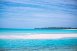 On the beach, sun-loungers, beach towels