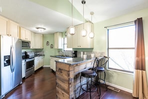 Private kitchen - SmokyStays Swiss Cottage Chalet (Gatlinburg)