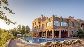 Outdoor pool, pool umbrellas, pool loungers