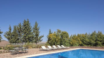 Outdoor pool, pool umbrellas, pool loungers