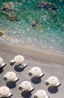 Private beach, sun loungers, beach towels, beach bar