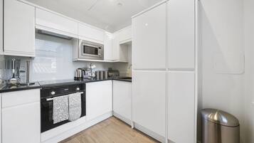 Luxury Apartment, 1 Bedroom, Non Smoking | Private kitchen | Fridge, microwave, oven, stovetop