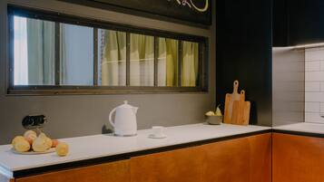 2 Bedrooms Design Apartment | Private kitchen | Mini-fridge, coffee/tea maker, electric kettle, toaster