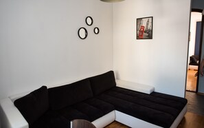 Comfort Apartment | Living room | 50-inch LED TV with cable channels, TV