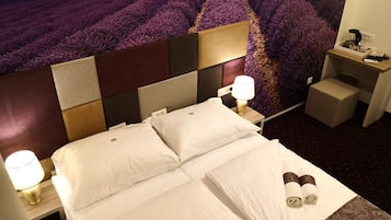 Minibar, coffres-forts dans les chambres, décoration personnalisée