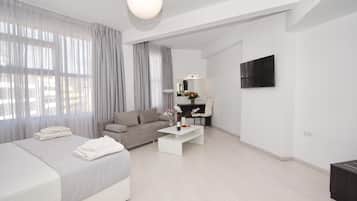 Värdeförvaringsskåp på rummet, skrivbord och arbetsyta för laptop