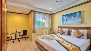 Desk, laptop workspace, free WiFi, bed sheets