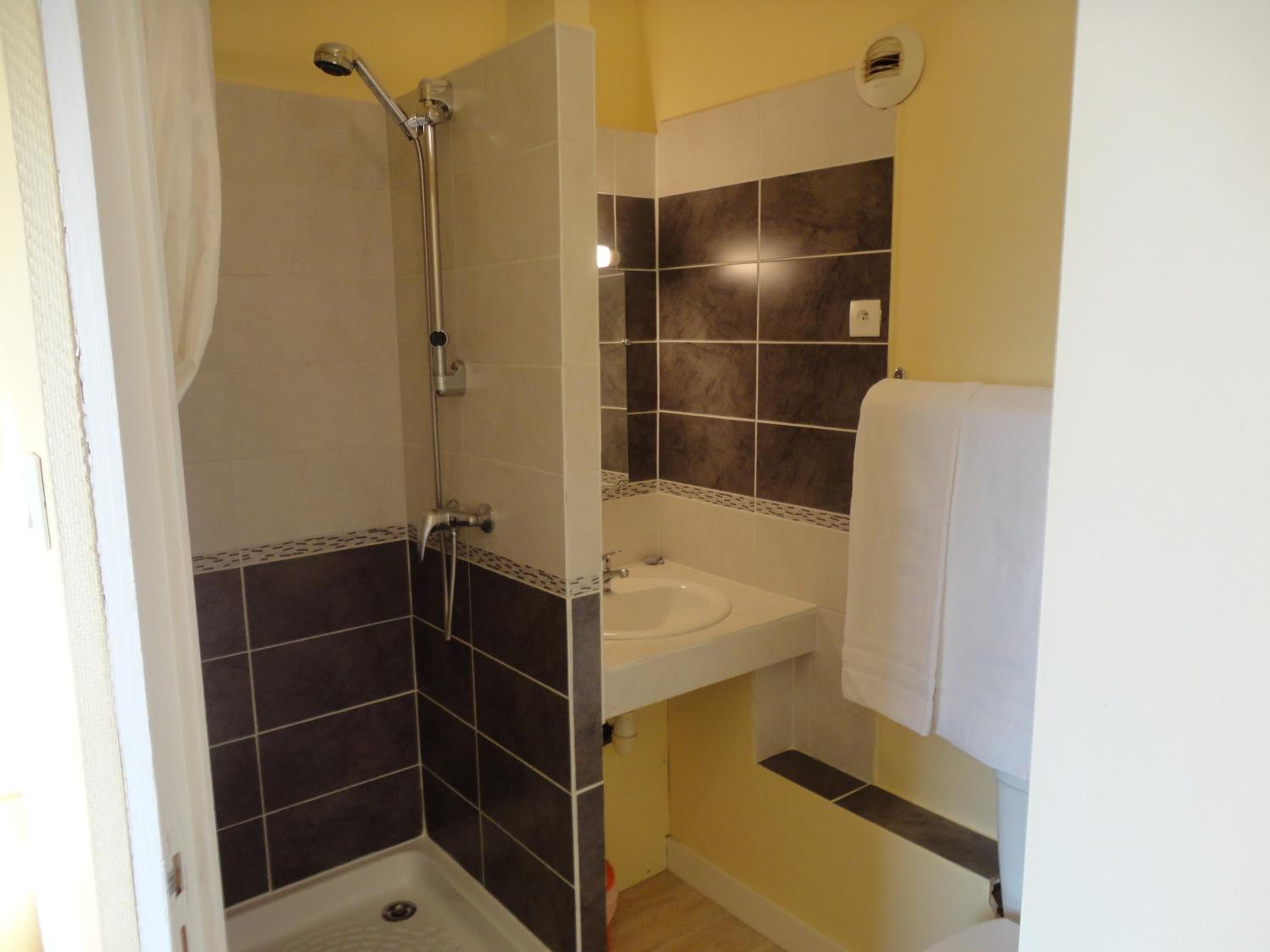 shower, towels, soap, shampoo