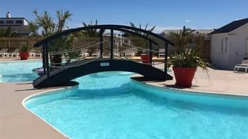 Seasonal outdoor pool, pool loungers