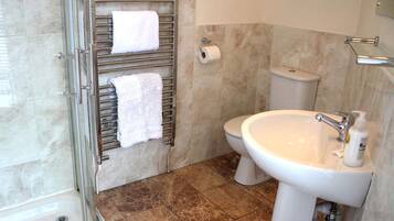 Four-Bedroom Apartment | Bathroom | Shower, hair dryer, towels