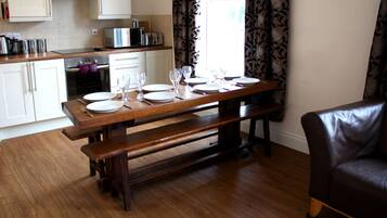 Four-Bedroom Apartment | Living room | TV