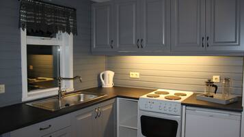 Cottage, 2 Bedrooms | Private kitchen | Stovetop, cookware/dishes/utensils
