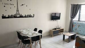Comfort Apartment, 2 Bedrooms | Living area | 32-inch Smart TV with digital channels, TV, fireplace - Cozy Homestay at Main Place (Subang Jaya)