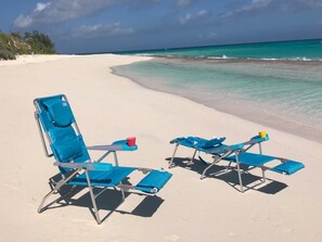 On the beach, sun-loungers, beach towels - OceanWaves, A Vacation to Remember!A 1minute walk to private gazebo and beach. (Governor's Harbour)