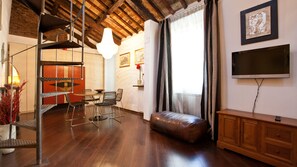 Apartment, 1 Bedroom | Living area | Flat-screen TV