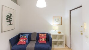 Apartment, 1 Bedroom | Living area | Flat-screen TV