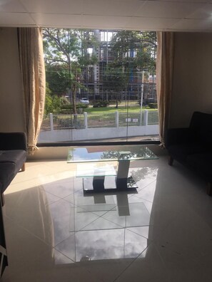 Lobby sitting area - Island Vibes Suites (Port of Spain)