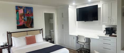 1 chambre, fer et planche à repasser, lit de bébé portatif