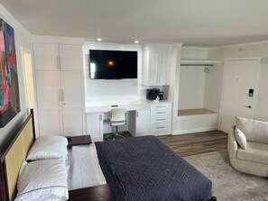 Iron/ironing board, travel crib, free WiFi, bed sheets