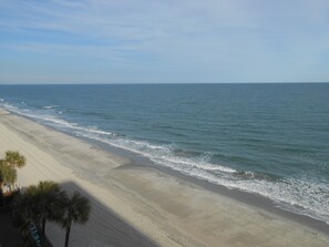 A beach with clear skies and calm waters. - 0610 Waters Edge Resort 1 Bedroom Condo by RedAwning (Murrells Inlet)