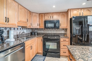 Condo, 2 Bedrooms | Private kitchen | Fridge, oven, coffee/tea maker, toaster