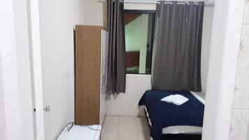 Kamar Quadruple Basic | Minibar, Wi-Fi gratis, dan seprai linen