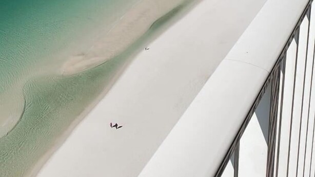 A beach with clear turquoise waters and a white sandy shore. - Beautiful gulf front, amazing views. Walk to Pier Park.   (Panama City Beach)