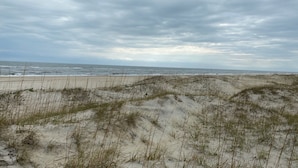 A beach with sand dunes and the ocean in the background. - Spectacular OCEAN and SOUND VIEW Private Pool (Salvo)