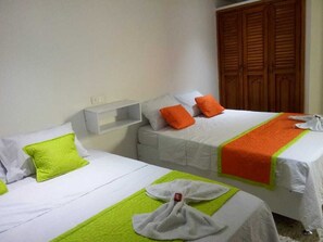 Familie vierpersoonskamer | Luxe beddengoed, gratis wifi, beddengoed