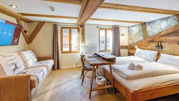 Een bureau, een laptopwerkplek, geluiddichte muren, gratis wifi