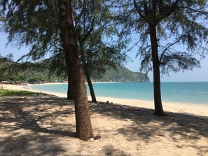 On the beach, sun loungers, beach towels