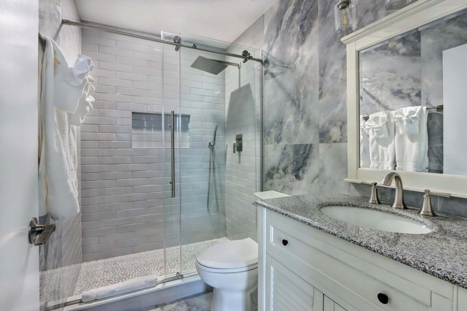 Bathtub, hair dryer, towels