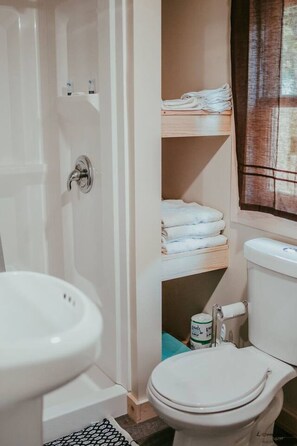 Shower, towels, soap, shampoo