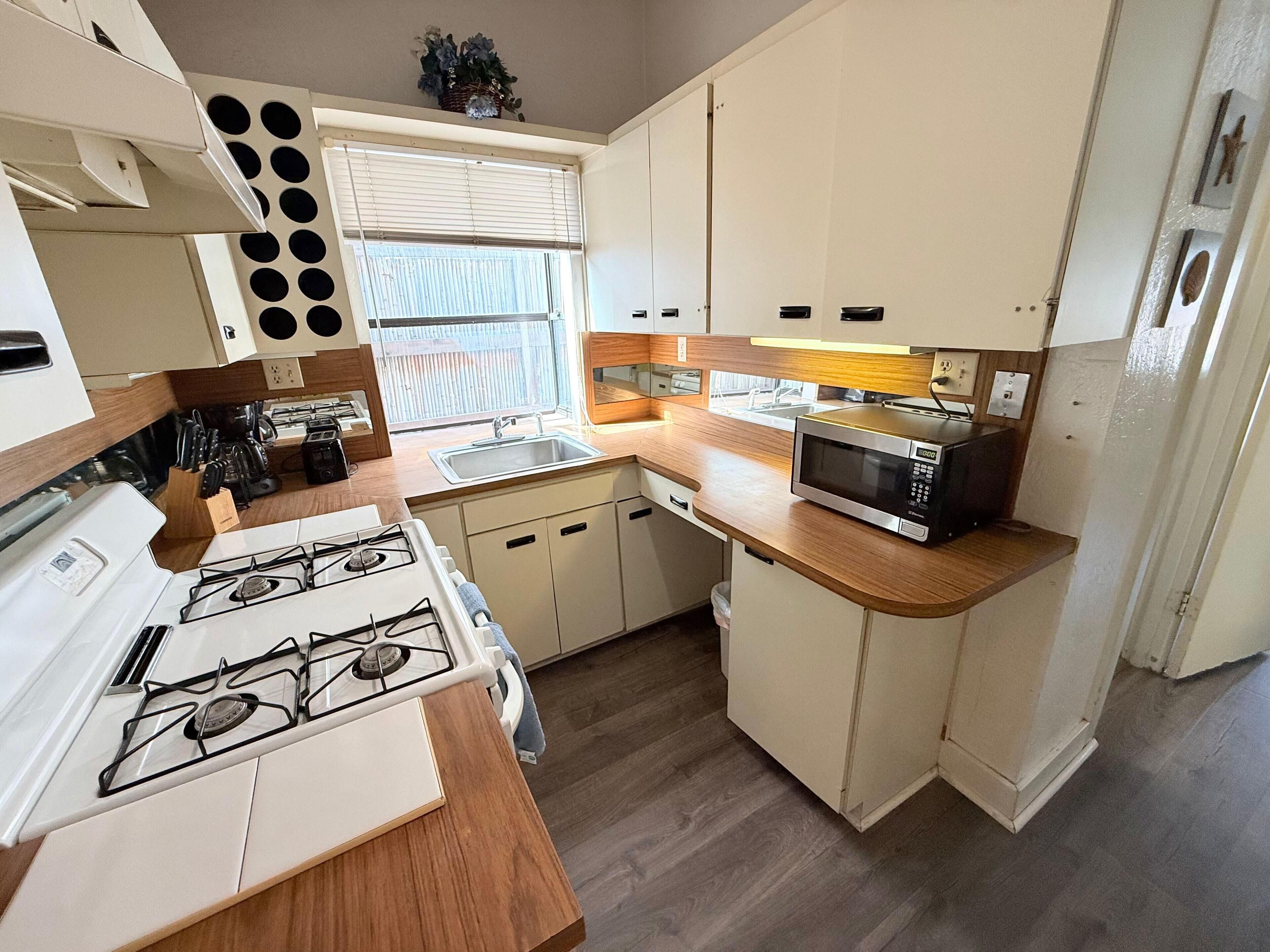 Cozy kitchen with ample counter space and natural light