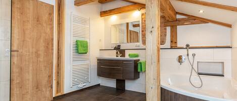 Bathtub, hair dryer, towels