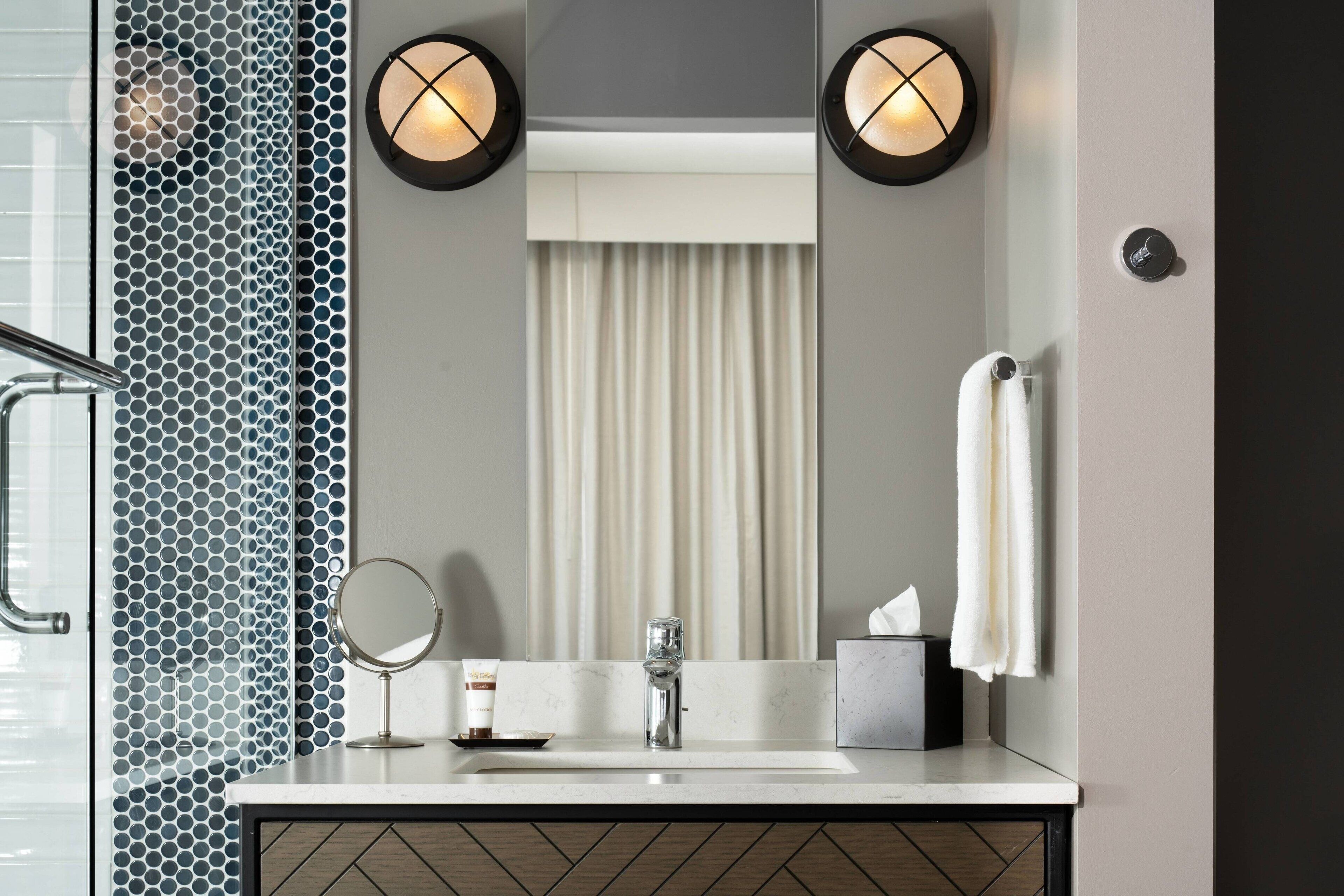 shower, designer toiletries, hair dryer, bathrobes