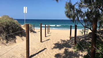 On the beach, sun loungers, beach towels