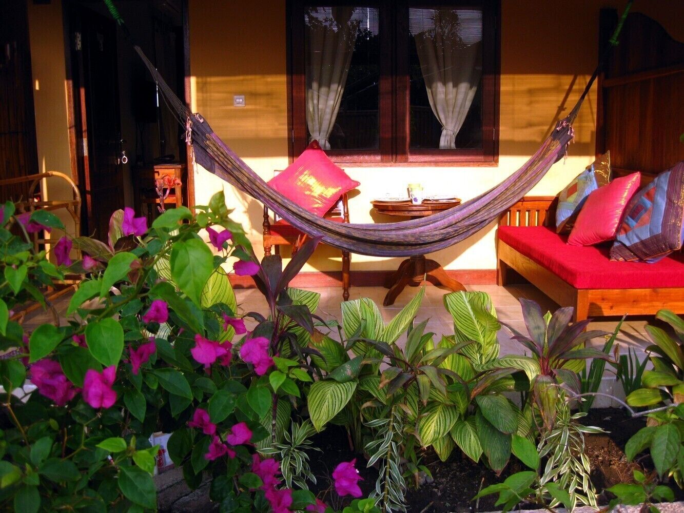 Terrace includes table for breakfast, bench and a hammock for chilling