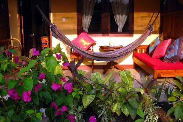 Terrace includes table for breakfast, bench and a hammock for chilling