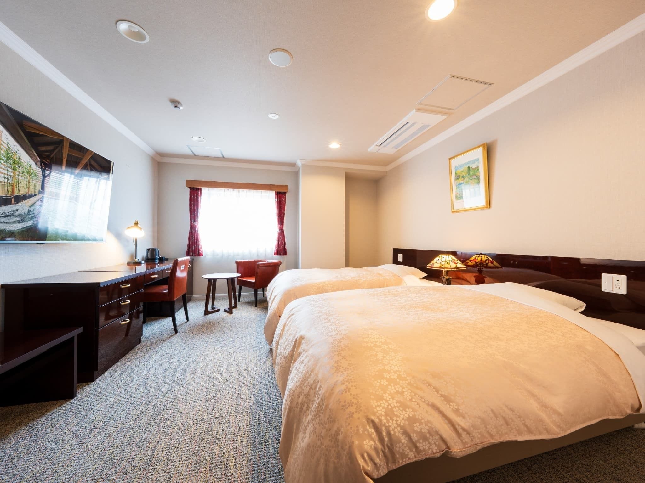 Camera Standard con 2 letti singoli, non fumatori | Una cassaforte in camera, ferro/asse da stiro, Wi-Fi gratuito