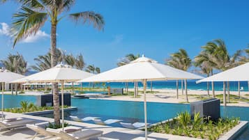 12 outdoor pools, open 6:30 AM to 6:30 PM, free pool cabanas