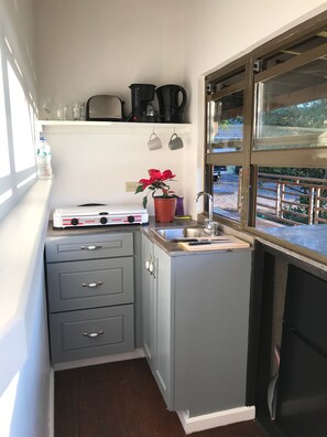 Fridge, toaster - Front View Apartment in a Modern Container Conversion (Montego Bay)
