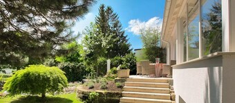 Holiday apartment with a special flair, view of the mountains and close to the lake.