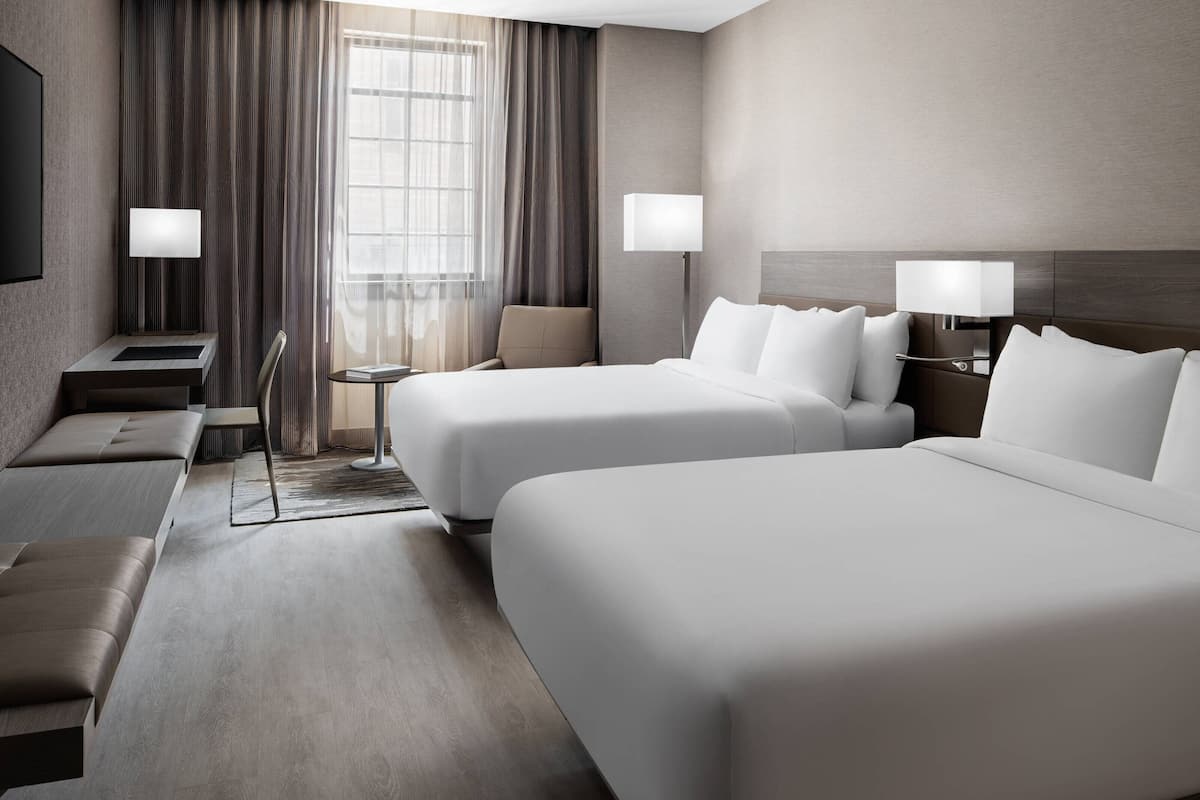 Premium bedding, down comforters, in-room safe, desk