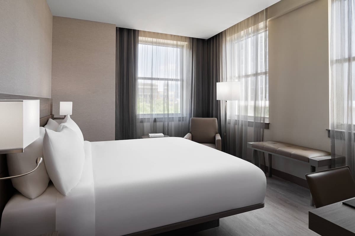 Premium bedding, down comforters, in-room safe, desk